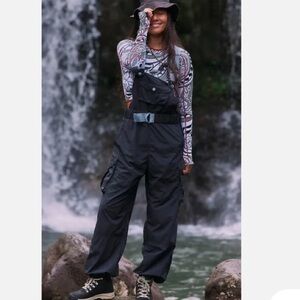 Free People Morning Meadow Nylon
Waterproof Rain Jumpsuit One Piece